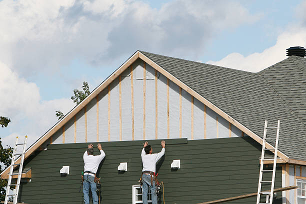 Professional Emergency Siding Repair technician working in Ridge, NY